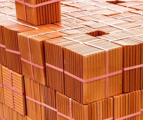 stack of brown tiles at the constructing site